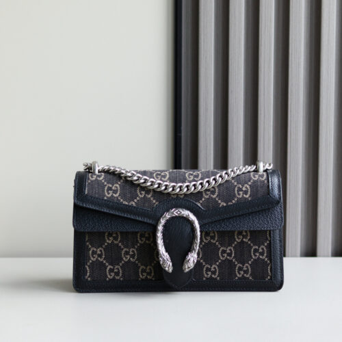 Body: Made of Gucci's classic GG monogram canvas Interior: Suede lining Dimensions: 20 × 13 × 6 cm