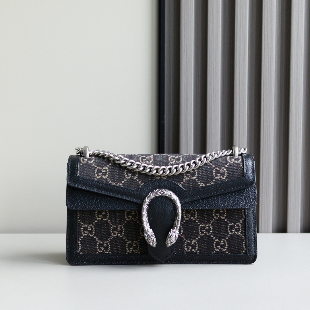Body: Made of Gucci's classic GG monogram canvas Interior: Suede lining Dimensions: 20 × 13 × 6 cm