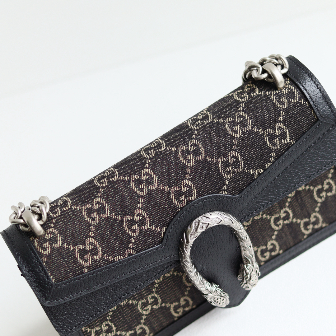 Body: Made of Gucci's classic GG monogram canvas Interior: Suede lining Dimensions: 20 × 13 × 6 cm - Image 4