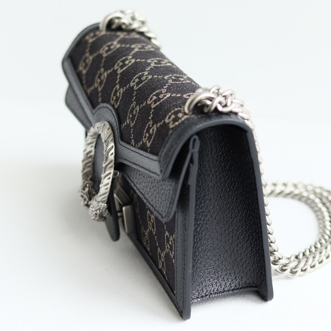 Body: Made of Gucci's classic GG monogram canvas Interior: Suede lining Dimensions: 20 × 13 × 6 cm - Image 5