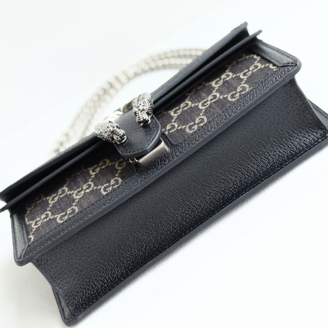 Body: Made of Gucci's classic GG monogram canvas Interior: Suede lining Dimensions: 20 × 13 × 6 cm - Image 6