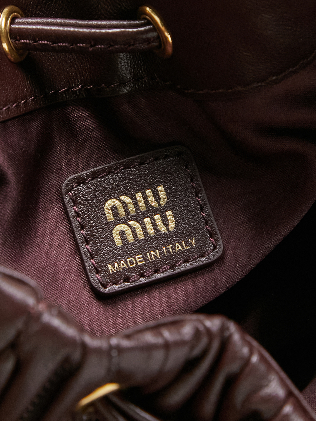 Miu Miu Matelassé genuine leather drawstring bucket bag - Image 10