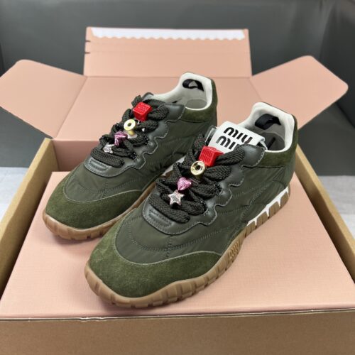 Miu Miu patchwork retro German training shoes with detachable pendant