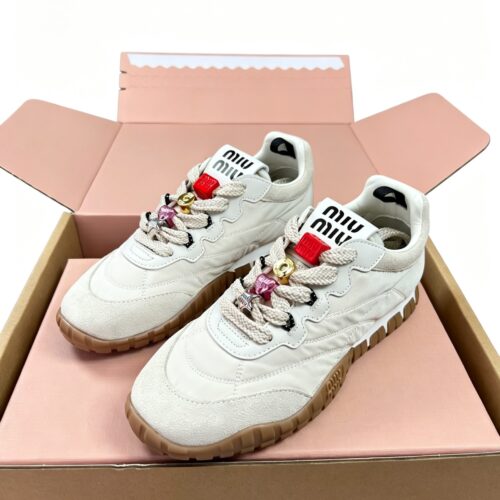 Alternative view of Miu Miu patchwork retro German training shoes with detachable pendant
