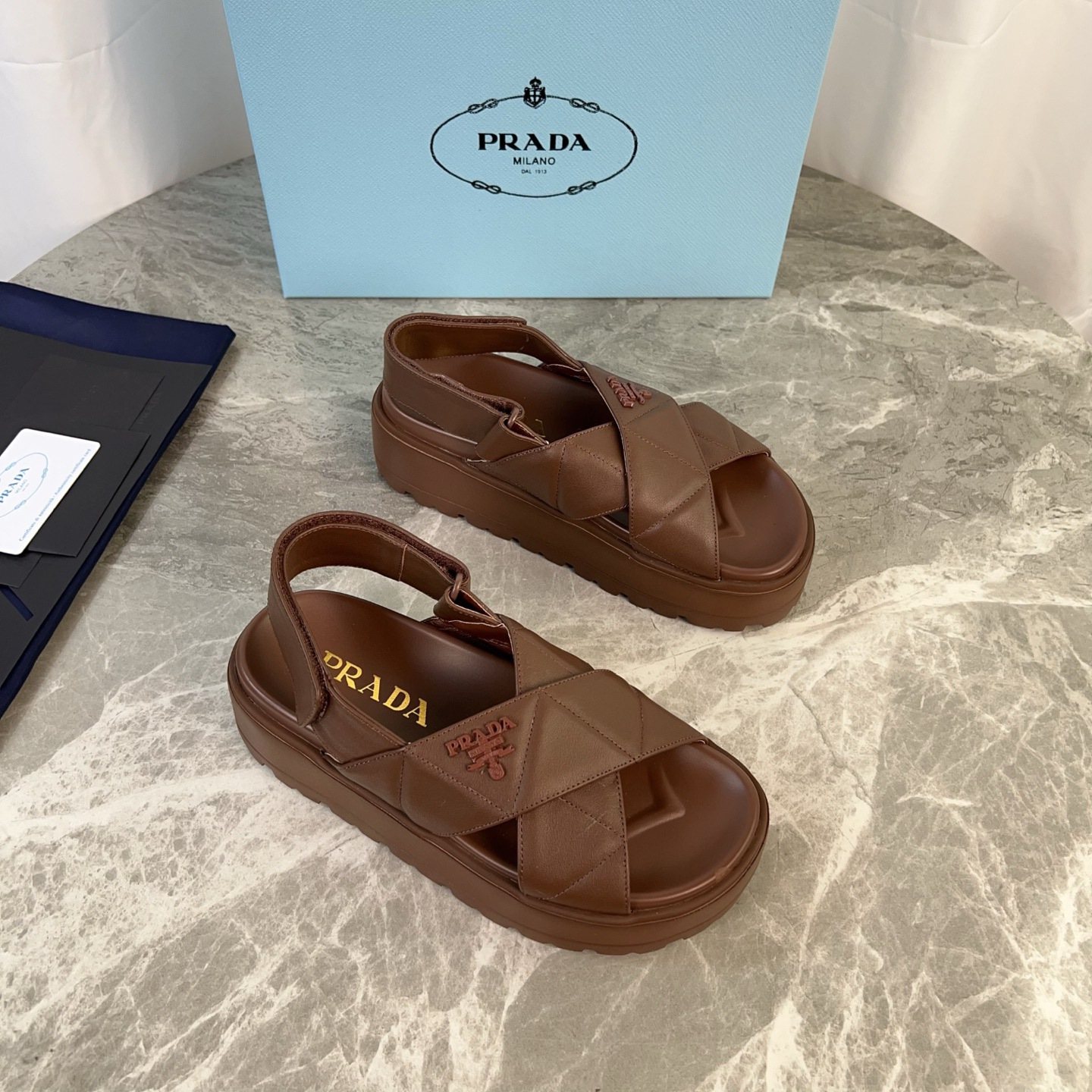 PRADA quilted cross-over platform sandals with back strap