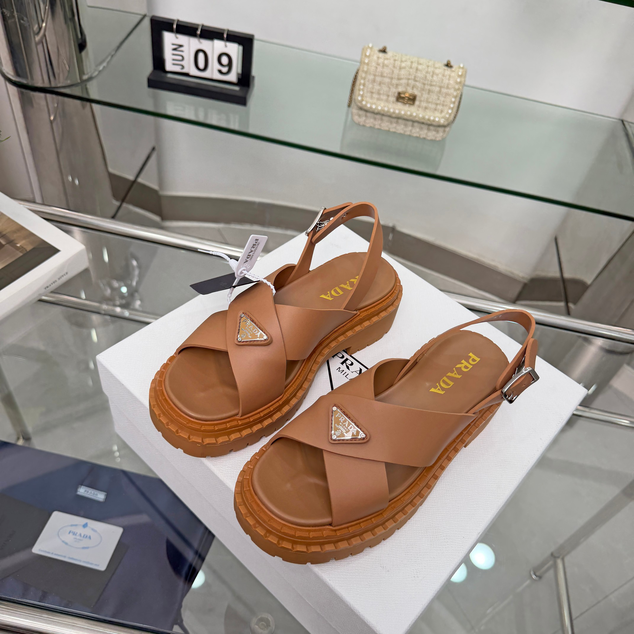 PRADA Triangle Logo Cross Strap Platform Back Buckle Sandals - Image 2